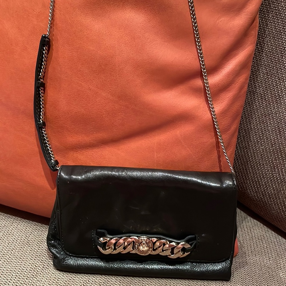 Marc Jacobs small bag with magnetic close.